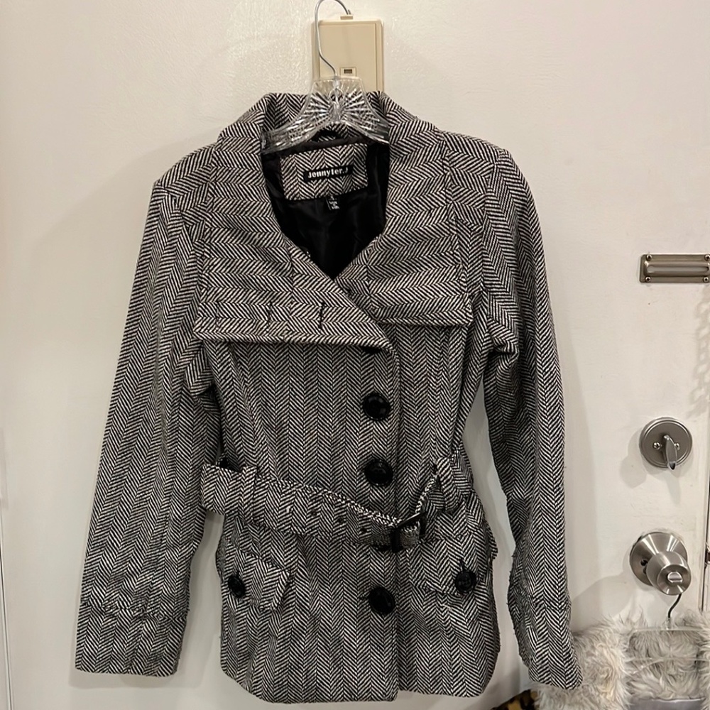 Black jacket, black, and white